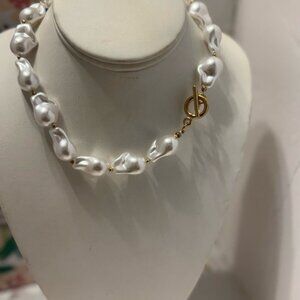 Elegant White Pearl Necklace with Gold Accents